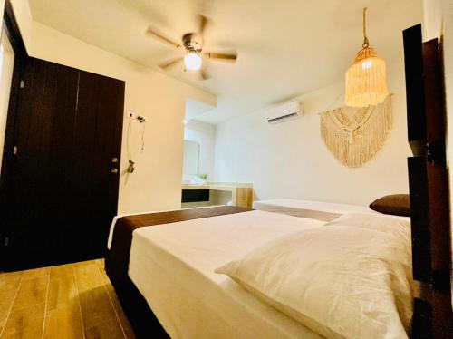 Voodi või voodid majutusasutuse Corazon de Tulum toas