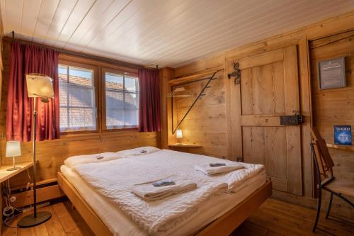 Postel nebo postele na pokoji v ubytování Gasthaus Rössli
