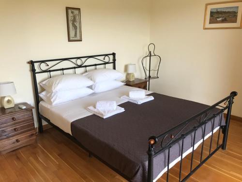 Ένα ή περισσότερα κρεβάτια σε δωμάτιο στο Villa Nino