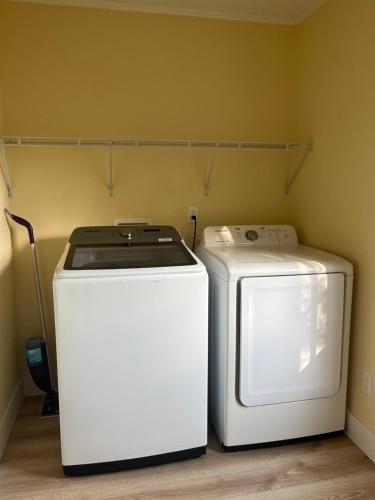 two machines sitting next to each other in a kitchen at The Perfect Get Away !!!! in Clewiston