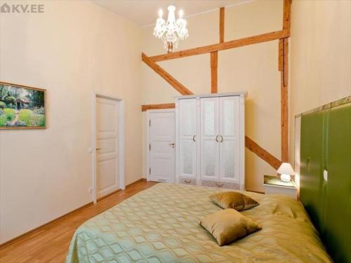 Ein Bett oder Betten in einem Zimmer der Unterkunft Cozy Apartment In Old Town