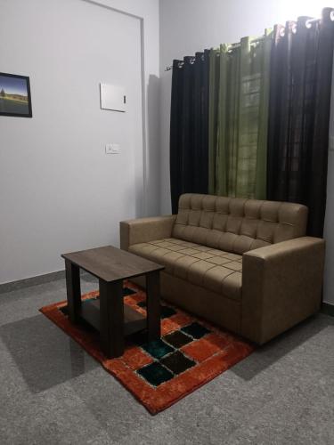 Wayanad Vista Service Apartmentにあるシーティングエリア