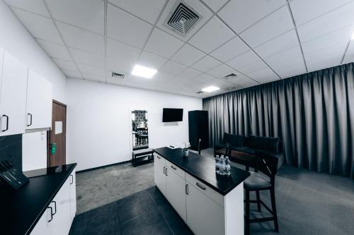 Μια τηλεόραση ή/και κέντρο ψυχαγωγίας στο Apartamenty EXPO Nadarzyn 3Rooms