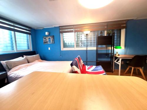 Katil atau katil-katil dalam bilik di Forêt Guest House Gangnam