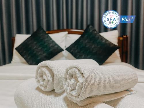 Ένα ή περισσότερα κρεβάτια σε δωμάτιο στο Alisa Krabi Hotel-SHA Plus