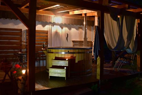 a hot tub in the middle of a patio at Letovisko Chobot - village resort in Kácov