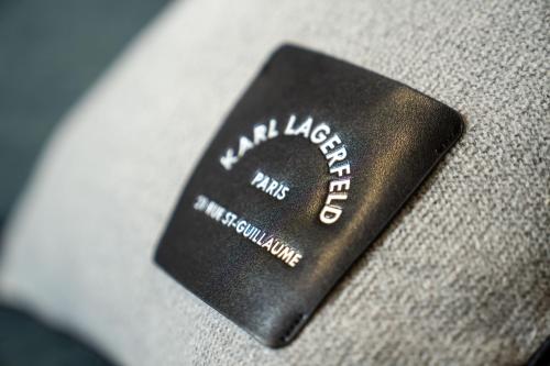 a black object with the name of a car manufacturer at Apartment VAZATAOR with sauna in Brežice