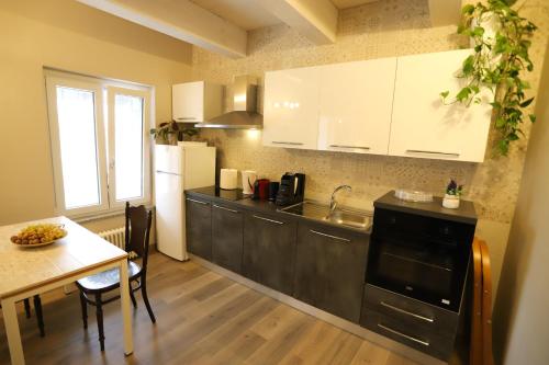 Kuchyň nebo kuchyňský kout v ubytování B&B 18 Gradini