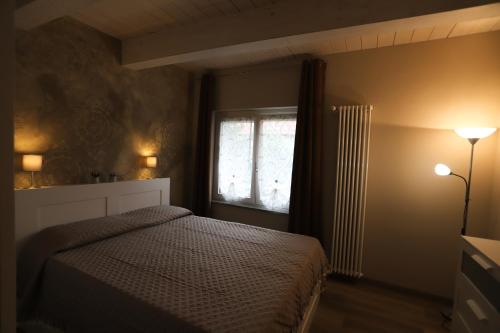 Ένα ή περισσότερα κρεβάτια σε δωμάτιο στο B&B 18 Gradini