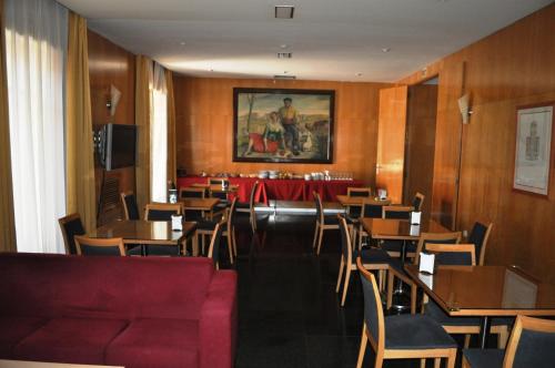 
Un restaurante o sitio para comer en Hotel España
