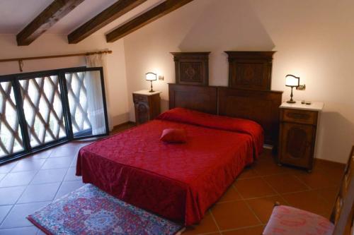 En eller flere senge i et værelse på Agriturismo Kogoj