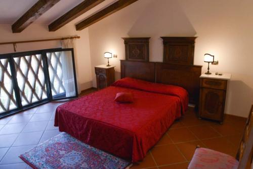 Postel nebo postele na pokoji v ubytování Agriturismo Kogoj
