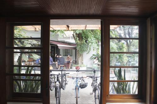 a group of bikes parked outside of a building at Hotel Bumi Asih Gedung Sate Bandung in Bandung