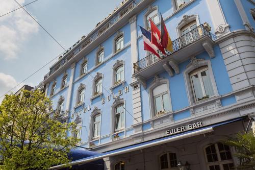 a blue building with the words fuller bar at Hotel Euler Basel in Basel