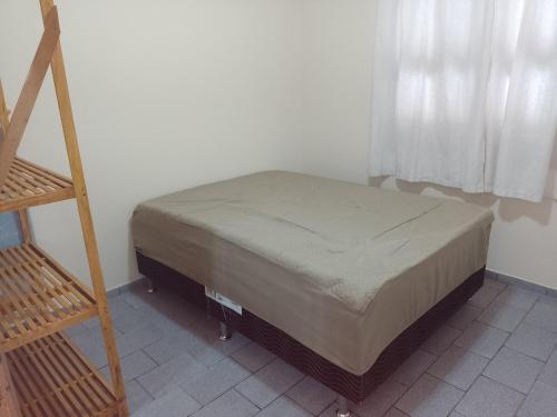 Katil atau katil-katil dalam bilik di Residencial Lumar