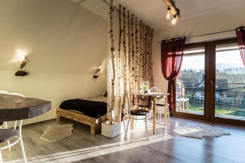 Χώρος καθιστικού στο Apartamenty Magiczny Kącik