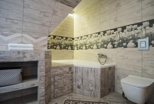 Ένα μπάνιο στο Apartamenty Magiczny Kącik