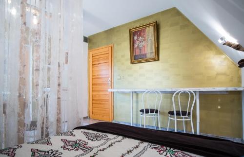Ένα ή περισσότερα κρεβάτια σε δωμάτιο στο Apartamenty Magiczny Kącik