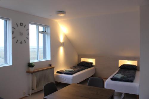 Postel nebo postele na pokoji v ubytování Guesthouse Hateigi 3