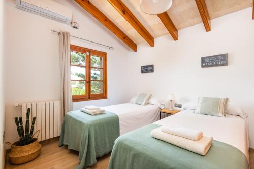 Postel nebo postele na pokoji v ubytování Villa Elena by Mauter Villas