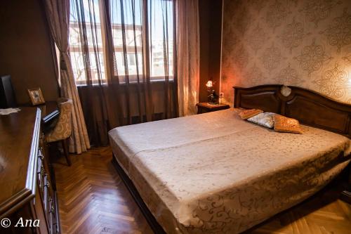 Кровать или кровати в номере The Pearl Apartment Varna
