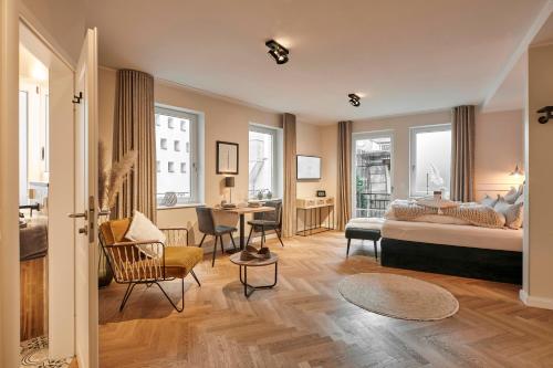 Postel nebo postele na pokoji v ubytování Loft 1540 - Boutique Ferienwohnungen