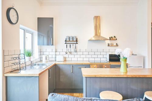 a kitchen with a sink and a counter top at Host & Stay - The Lookout in Scarborough