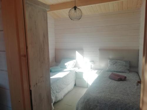 Postel nebo postele na pokoji v ubytování WOODHOUSE