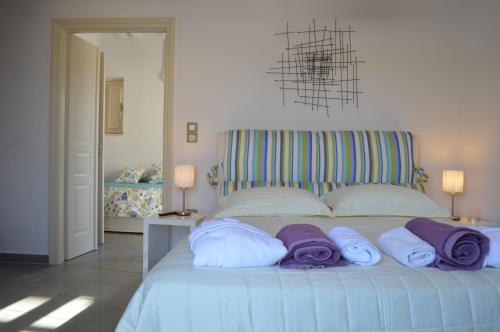 Ένα ή περισσότερα κρεβάτια σε δωμάτιο στο Villa Byzantino