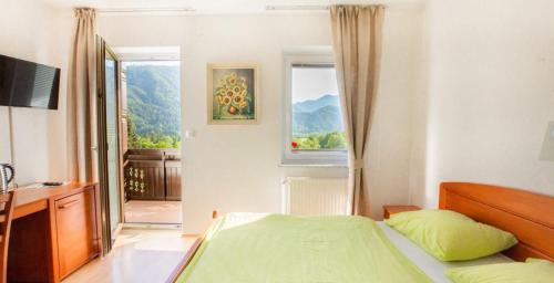 Postel nebo postele na pokoji v ubytování Nature Hotel Lukanc