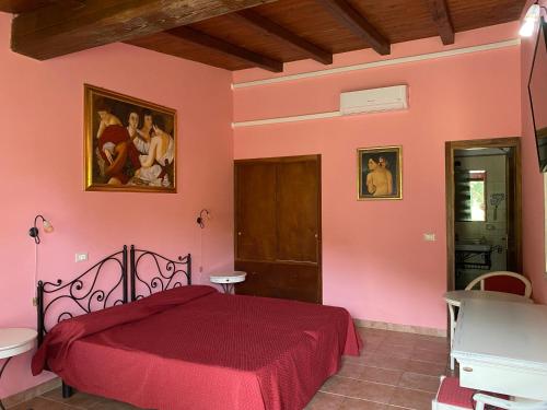 Katil atau katil-katil dalam bilik di Agriturismo Montefosco
