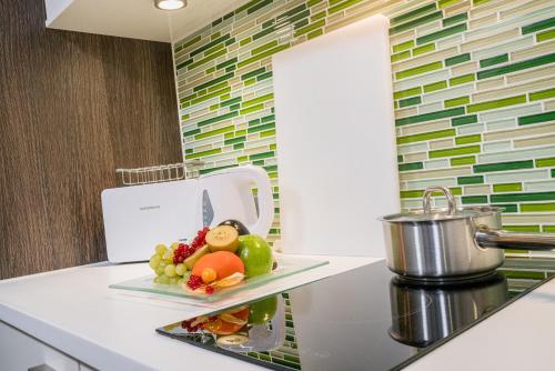 a plate of vegetables on a counter in a kitchen at Best Western Hotel Airport Frankfurt in Frankfurt/Main