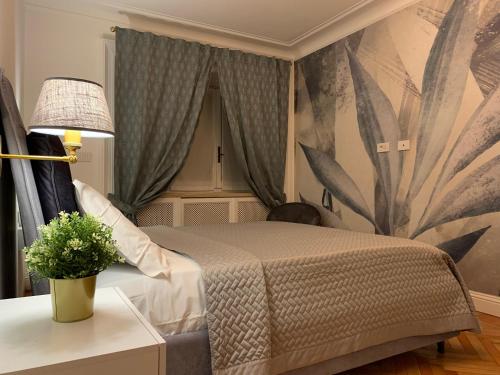 Ένα ή περισσότερα κρεβάτια σε δωμάτιο στο Turin Central Apartment