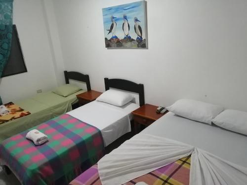 Katil atau katil-katil dalam bilik di Hostal La Casa de Luis