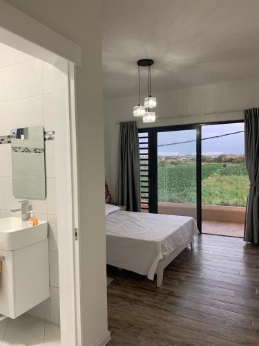 Ένα ή περισσότερα κρεβάτια σε δωμάτιο στο Villa Aussee Mauritius