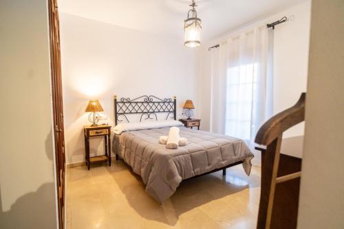 Posteľ alebo postele v izbe v ubytovaní Luxury Ronda Center