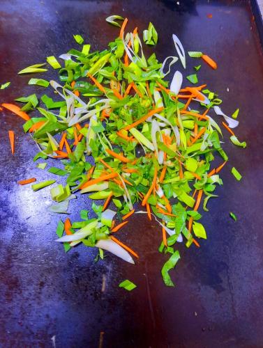 a pile of chopped up vegetables on a table at La Casa Safari Resort in Udawalawe