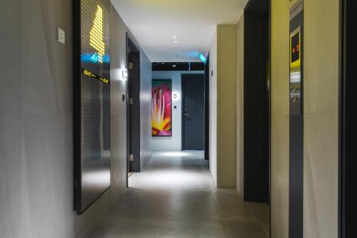 a hallway of a building with a hallwayngth at City Inn Macau in Macau