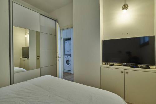 Ένα ή περισσότερα κρεβάτια σε δωμάτιο στο Arnon APR Gordon area