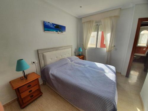 Postel nebo postele na pokoji v ubytování casa relax nudista