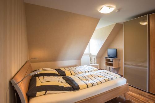 Postel nebo postele na pokoji v ubytování Ida's Hus