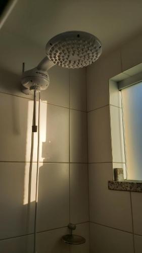 Ett badrum på Apart Resort Vila das Águas Veraneio