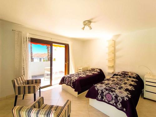 Postel nebo postele na pokoji v ubytování Rentaliday Brisas del Atlantico