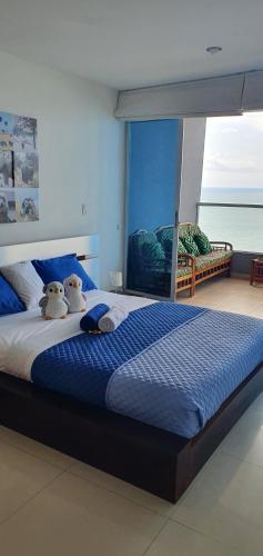 Ένα ή περισσότερα κρεβάτια σε δωμάτιο στο Departamento Frente al Mar Diamond Beach