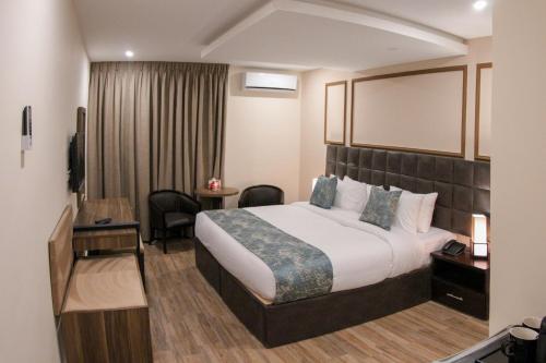 Letto o letti in una camera di Post Boutique Hotel Amman