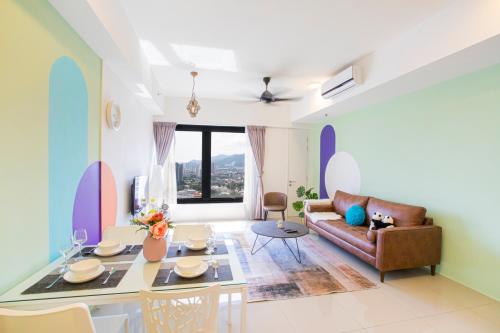 a living room with a couch and a table at Georgetown High Floor Luxury 3BR Suite in George Town