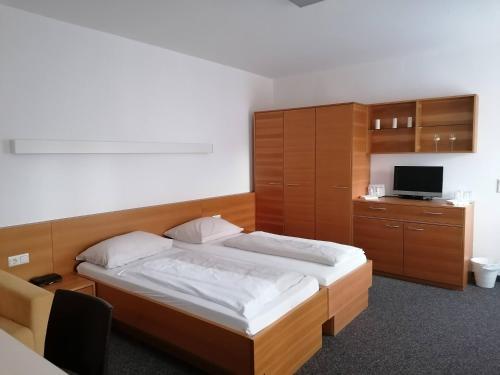 En eller flere senge i et værelse på Villa Styria