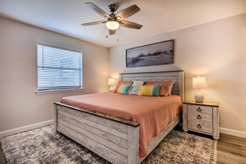a bedroom with a bed and a ceiling fan at Orange Beach Condo with Shared Pool and Views! in Orange Beach