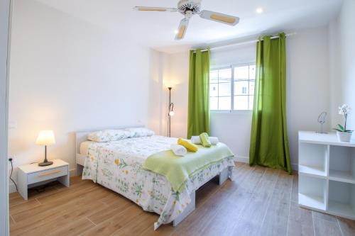 Postel nebo postele na pokoji v ubytování Bernia Apartment