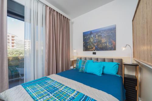 Soho City MK LUX Apartment tesisinde bir odada yatak veya yataklar